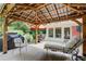 Back porch featuring plenty of shade and a place to relax at 2440 Weatherford Ct, Marietta, GA 30068