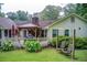 Charming backyard with a gazebo, deck, mature plantings, and a swing at 2440 Weatherford Ct, Marietta, GA 30068