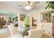 Bright dining room featuring a glass table, cushioned chairs, and seamless flow into other living areas at 2440 Weatherford Ct, Marietta, GA 30068