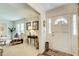Bright and airy entryway leads to a cozy living room, showcasing a welcoming ambiance with stylish decor at 2440 Weatherford Ct, Marietta, GA 30068