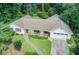 Charming home with a well-manicured lawn, a two-car garage, and a welcoming front porch at 2440 Weatherford Ct, Marietta, GA 30068