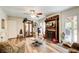 Inviting living room features a fireplace, a ceiling fan, and wood flooring at 2440 Weatherford Ct, Marietta, GA 30068