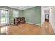 Inviting dining space with hardwood floors and a door leading to the outdoor space at 33 Russell Rd, Mcdonough, GA 30252