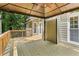 Expansive wooden back deck overlooking lush trees, perfect for relaxation and entertainment at 77 Skyland Dr, Roswell, GA 30075