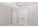 This bedroom includes neutral walls, carpet, white doors, and white trim at 77 Skyland Dr, Roswell, GA 30075