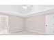 Spacious bedroom features neutral colors and a ceiling fan for added comfort at 77 Skyland Dr, Roswell, GA 30075