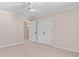 Bedroom with a closet and a doorway to another room at 77 Skyland Dr, Roswell, GA 30075