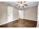 This room features wood floors, neutral walls, and a ceiling fan with lighting at 91 Tatum St, Marietta, GA 30060