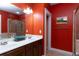 Bathroom boasting double sink vanity and walk-in glass shower at 1190 Hardee Ne St, Atlanta, GA 30307