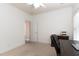 Bright bedroom with plush carpet, crown molding, and a ceiling fan for added comfort at 1190 Hardee Ne St, Atlanta, GA 30307