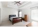 Bright bedroom with tray ceiling, ceiling fan, and natural light at 1190 Hardee Ne St, Atlanta, GA 30307