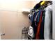 Walk-in closet featuring custom shelving and organization system at 1190 Hardee Ne St, Atlanta, GA 30307
