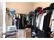 Walk-in closet with custom shelving and ample storage space at 1190 Hardee Ne St, Atlanta, GA 30307