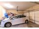 Attached garage featuring a car, automatic door, and ample space for parking and storage at 1190 Hardee Ne St, Atlanta, GA 30307