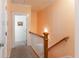 Upstairs hallway showcasing neutral decor and white railing at 1190 Hardee Ne St, Atlanta, GA 30307