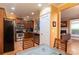 Well-designed kitchen with hardwood floors, stainless steel appliances, and open to the dining room and living room at 1190 Hardee Ne St, Atlanta, GA 30307