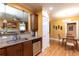 Open kitchen layout with granite countertops, stainless appliances, and seamless dining area access at 1190 Hardee Ne St, Atlanta, GA 30307