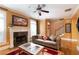 Cozy living room features hardwood floors, fireplace, and access to the staircase at 1190 Hardee Ne St, Atlanta, GA 30307