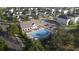 Community pool and clubhouse surrounded by well-maintained homes and landscaping at 1817 Holmsey Se Cir, Conyers, GA 30094