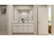 Elegant bathroom with double vanity, ample counter space, and modern fixtures at 1817 Holmsey Se Cir, Conyers, GA 30094