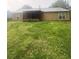 View of the backyard and screened in back porch at 3040 Garnet Way, Atlanta, GA 30349