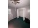 Bedroom includes closet and window with a view to the outside at 3040 Garnet Way, Atlanta, GA 30349
