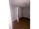 Bedroom includes ceiling fan and ample space with grey painted walls at 3040 Garnet Way, Atlanta, GA 30349