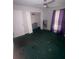 Bedroom with closet, drawers, and natural light beaming through the window at 3040 Garnet Way, Atlanta, GA 30349