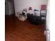 Bright living room with hardwood floors and natural light coming through the window at 3040 Garnet Way, Atlanta, GA 30349