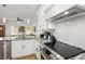 A kitchen with white subway tile backsplash, stainless appliances, and granite counters at 1302 Ladd St, Atlanta, GA 30310