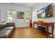 Cozy living room with hardwood floors, large windows, and modern decor at 1302 Ladd St, Atlanta, GA 30310