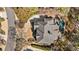 Aerial view of home featuring backyard pool, patio, pristine landscaping, and mature trees at 2250 Blackheath Trce, Alpharetta, GA 30005