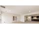 Spacious basement with french doors, recessed lights, and a wet bar at 2250 Blackheath Trce, Alpharetta, GA 30005
