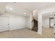 The basement includes a finished stairway, a storage room and access to additional living space at 2250 Blackheath Trce, Alpharetta, GA 30005
