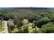 A sprawling view showcasing a house nestled among lush greenery, offering both privacy and a sense of community at 3500 Thunderwood Ln, Snellville, GA 30039