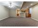 Spacious basement with neutral paint, updated carpeting and a bar area at 3500 Thunderwood Ln, Snellville, GA 30039