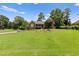 Charming brick home with a well-maintained front yard and beautiful landscaping at 3500 Thunderwood Ln, Snellville, GA 30039