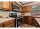 Kitchen with stainless steel appliances and updated countertops at 3500 Thunderwood Ln, Snellville, GA 30039