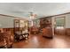 Beautiful living room with a fireplace, hardwood floors, and ample seating at 3500 Thunderwood Ln, Snellville, GA 30039