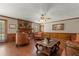 Spacious living room featuring a brick fireplace and sophisticated decor at 3500 Thunderwood Ln, Snellville, GA 30039