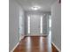 Inviting entryway with hardwood floors and a front door with sidelights at 420 Spring Lake Ter, Covington, GA 30016