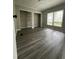 This bedroom has neutral walls, two large closets and updated flooring at 6830 Pawnee Trl Se, Acworth, GA 30102