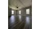 Bright bedroom with modern flooring and large windows that fill the room with light at 6830 Pawnee Trl Se, Acworth, GA 30102
