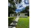 Well-maintained single-story home with a tidy front lawn and inviting entrance at 6830 Pawnee Trl Se, Acworth, GA 30102