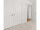 Bedroom featuring neutral carpet, fresh paint, and walk-in closets at 2472 Cotton Ln, Douglasville, GA 30135