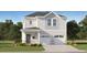 Charming two-story home with gray siding, double garage, and landscaped front yard at 2472 Cotton Ln, Douglasville, GA 30135