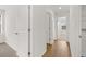 Hallway featuring neutral carpet and fresh paint at 2472 Cotton Ln, Douglasville, GA 30135