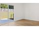 Bright living room featuring sliding glass door leading to the outdoor space at 2472 Cotton Ln, Douglasville, GA 30135