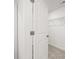 Bright walk-in closet featuring neutral carpet and wire shelving for organized storage at 2472 Cotton Ln, Douglasville, GA 30135