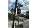Street corner with visible stop sign, hidden driveway sign, and street names of Spring Strand and Elizabeth Street at 2880 Elizabeth Se St, Smyrna, GA 30080